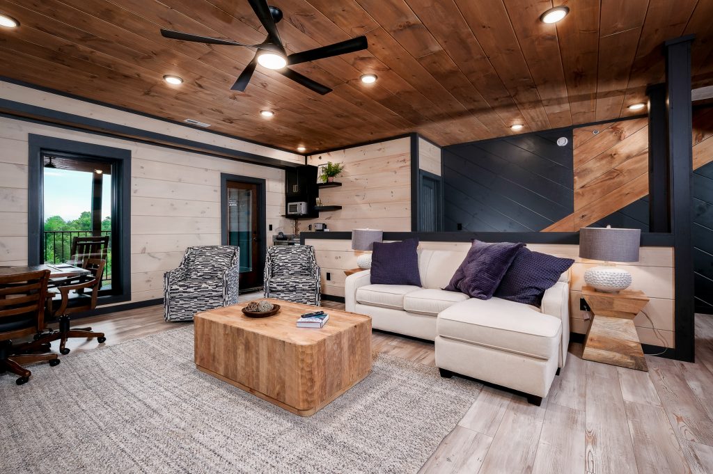 Modern cabin living room and home office at a vacation rental in Sevierville, Tennessee.