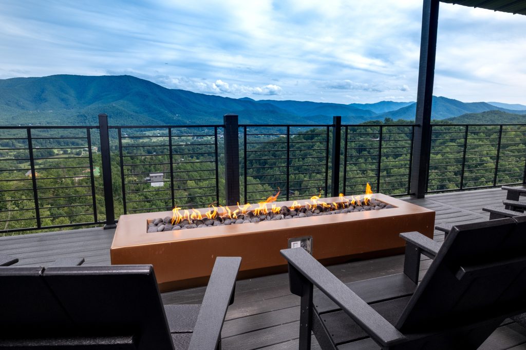 Bedroom desk with round mirror at a vacation rental in Wears Valley in the Smoky Mountains.