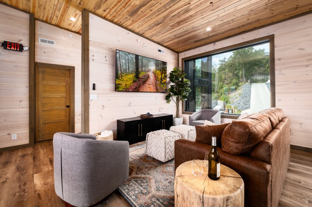 Upstairs lounge with fireplace at a vacation rental in Wears Valley in the Smoky Mountains.