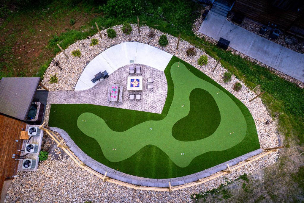 Aerial view of private putting green and fire pit at a vacation rental in Pigeon Forge, Tennessee.